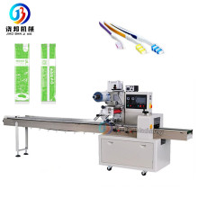 Automatic Pillow Type Disposable Toothpaste Toothbrush Comb Packaging Machine Low Price